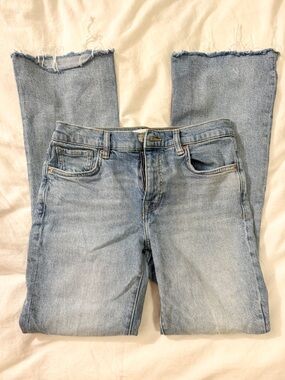 Mango blue mid rise bootcut light wash denim jeans.